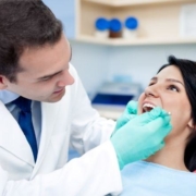 Dentist working on patient's teeth